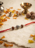 Floral Barrel Rudraksha Silver Rakhi